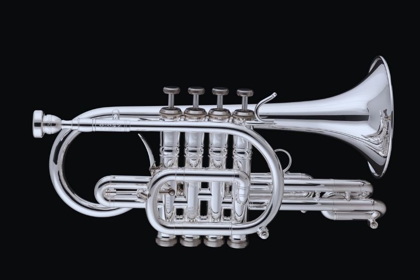what instrument did louis armstrong play before the trumpet